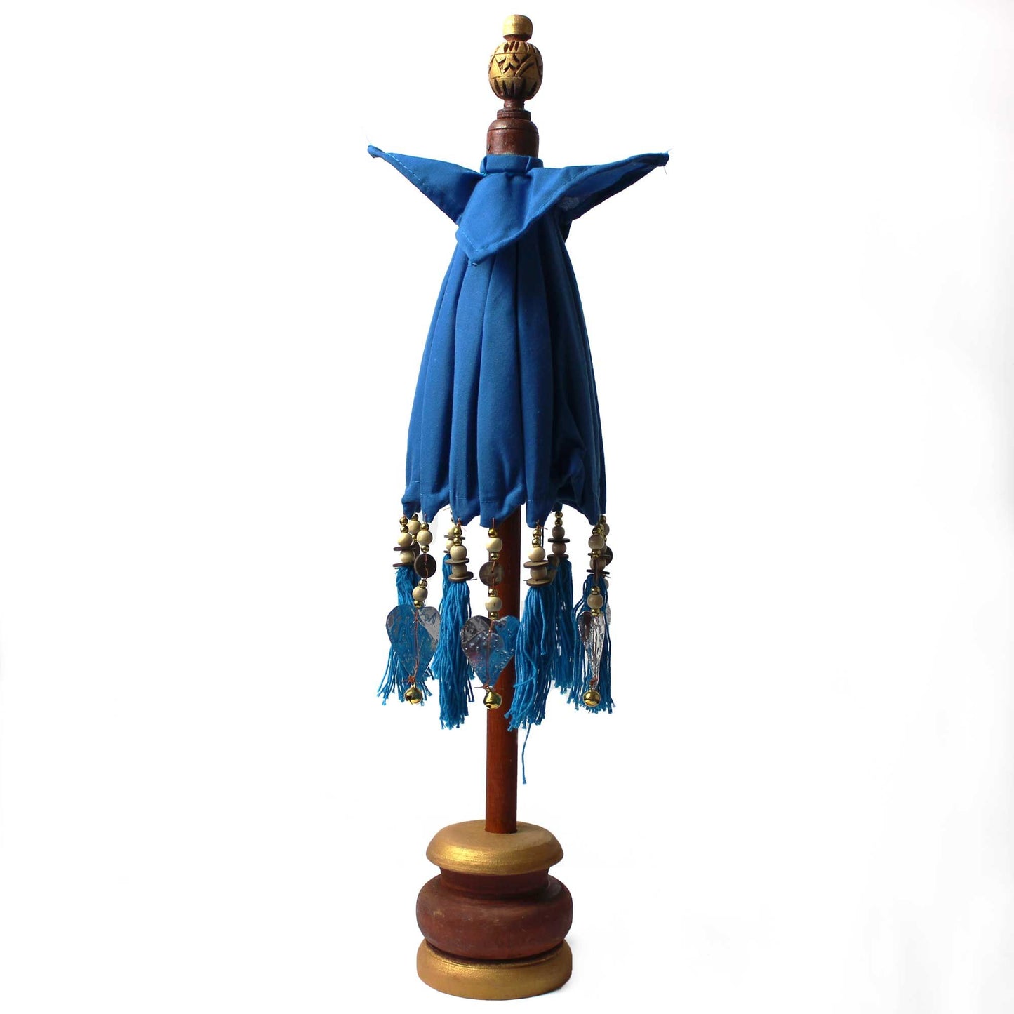 Zijaanzicht van turquoise katoenen Bali-parasol met kwastjes en houten handvat, 68 cm hoog, tropisch woonaccessoire voor aan zee
