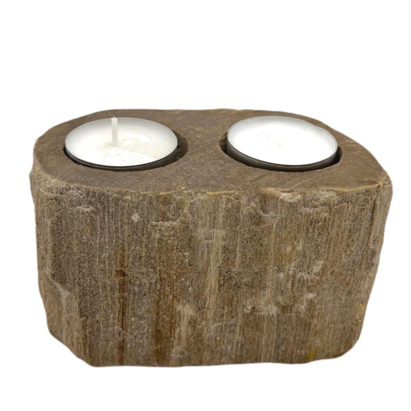 Bovenaanzicht van een kandelaar van versteend hout met twee ruimte voor theelichtjes, natuurlijke steen- en houtpatronen en organische texturen.
