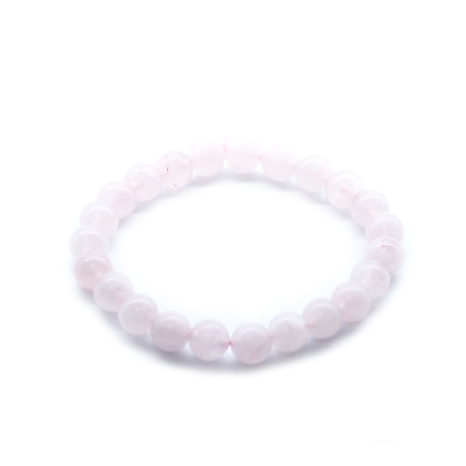 Rozenkwarts power armband met natuurlijke zachtroze edelstenen op een witte achtergrond met houten cadeaulabel, elastische healing sieraden voor hartchakra liefde en compassie