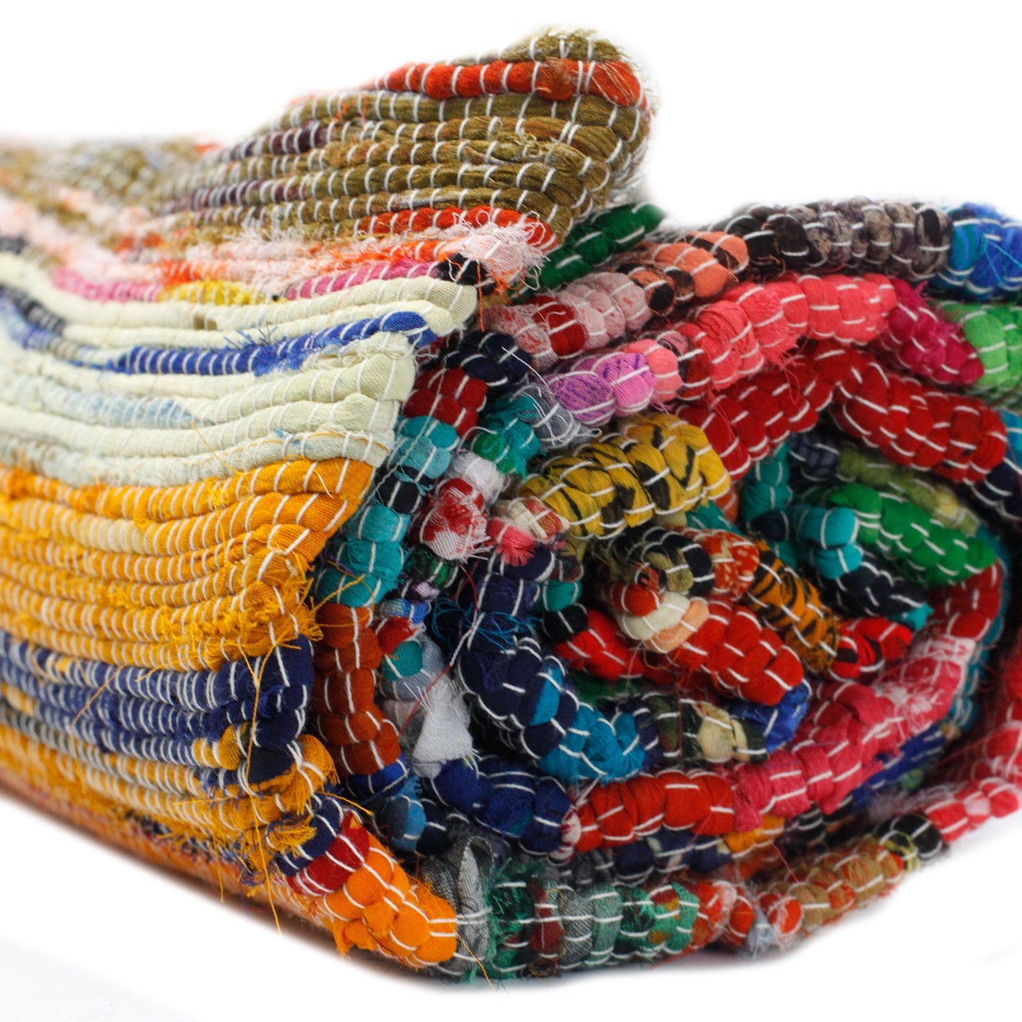 Close-up textuur handgeweven kleed gerecycled tapijt natuurlijke tinten
