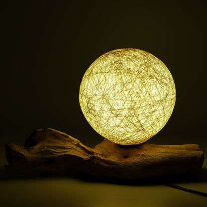 Close-up Driftglow lamp cotton wrap kap, fibreglass met katoendraad textuur
